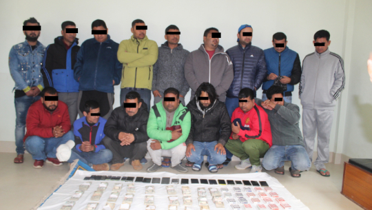 Sixteen arrested for gambling
