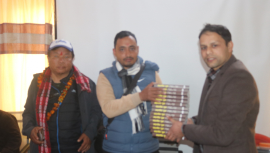 Young Social Worker Badu Donates Books on Mahavir Pun's Autobiography