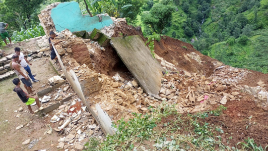 Two houses destroyed in a landslide in Baitadi