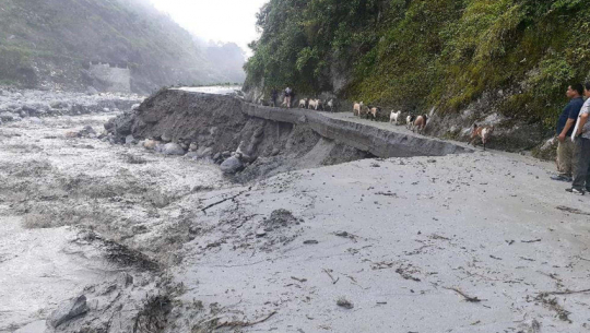 Flood sweeps away Surma road section