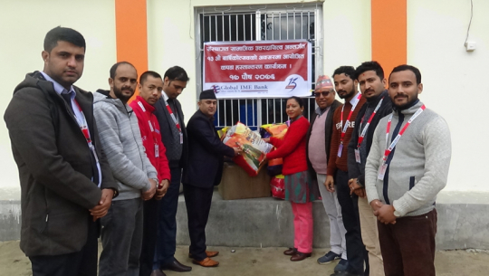 Global IME Bank donates clothes on its anniversary