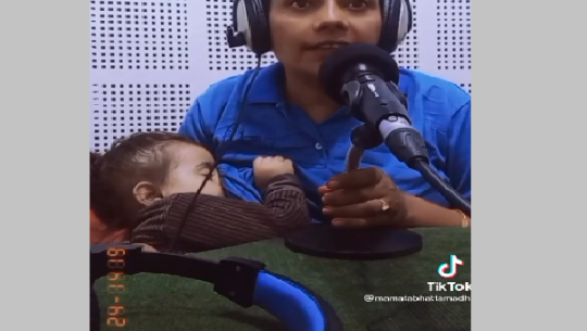 A video of a RJ reading news while her child breast feeds goes viral 