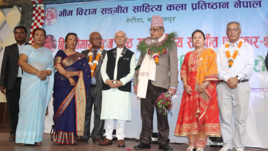 गीतकार राजेन्द्र थापा र गायिका निशा देशार सम्मानित